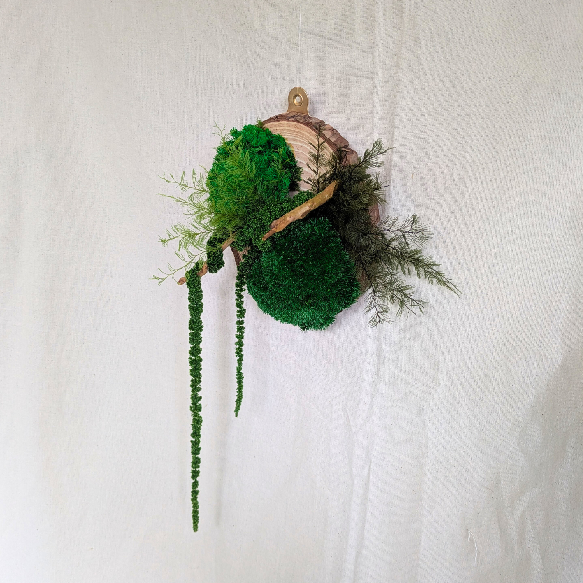 Wood Slice Decor with Preserved Moss featuring Driftwood, Air Ferns & Amaranthus